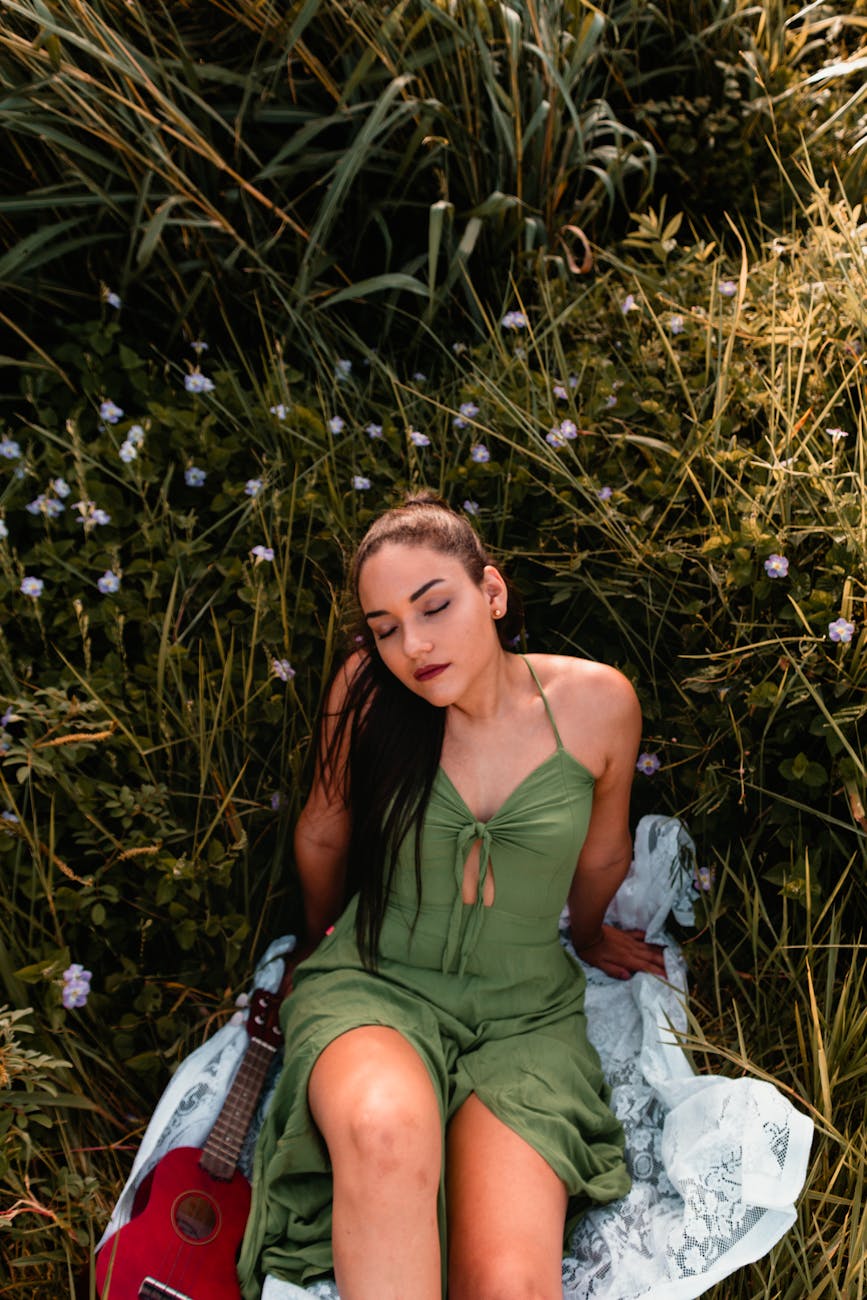 woman sitting on grass